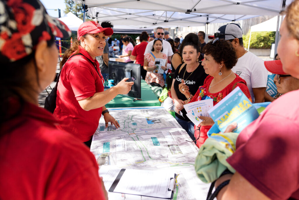 Voces del Canal member Aurelia introducing TAM’s Bellam Blvd Improvement to community members (picture on the right)